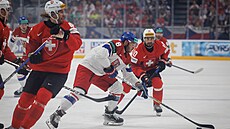 Ond�ej Beránek proniká �výcarskou obranou.