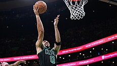 Jayson Tatum (0) z Boston Celtics zakon�uje.