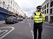 Policie operuje ped restaurací v Hackney ve východním Londýn, kde byli pi...