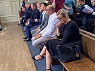 Lavice obalovaných ve fotbalové kauze u okresního soudu v Plzni. Roman Berbr...