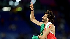 Italský vý�ka� Gianmarco Tamberi se raduje z vít�zství na mistrovství Evropy...