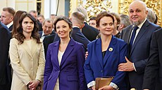 Píbuzná ruského diktátora Vladimira Putina Anna Civiljovová (druhá zprava) na...