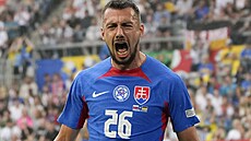 Slovenský úto�ník Ivan Schranz se raduje z gólu proti Ukrajin� na mistrovství...