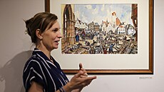 Spolukurátorka výstavy Jana Sou�ková u jednoho z d�evoryt� Gustava Kruma,...