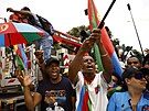 Eritrejtí fanouci slaví vítzství Biniama Girmaye ve tetí etap Tour de...