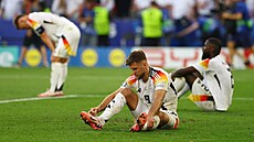 Zklamaní n�me�tí hrá�i po vy�azení ve �tvrtfinále se �pan�lskem.