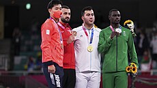 Karatista Tareg Hamedi (v zeleném) získal na olympijských hrách v Tokiu pro...