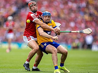 Momentka z celoirského finále v hurlingu mezi Clare a Corkem v ervenci 2024. V...