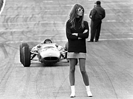 Look out , beautiful . Brands Hatch , England ; Nonchalent hazard for racing...