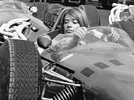 Francoise Hardy at the wheel of a Formula I Ferrari in the film 'Grand Prix' by...