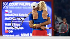 ZLATÉ OBJETÍ. Tenisté Tomá� Machá� a Kate�ina Siniaková jsou olympijskými...