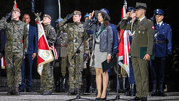 Polish military members and a Scout salute during a ceremony commemorating the 85th anniversary of the start of World War Two at Westerplatte, where dozens of Polish soldiers defied the overwhelming firepower of a Nazi German naval fleet, in Gdansk, Poland September 1, 2024. Agencja Wyborcza.pl/Michal Ryniak via REUTERS   ATTENTION EDITORS - THIS IMAGE WAS PROVIDED BY A THIRD PARTY. POLAND OUT. NO COMMERCIAL OR EDITORIAL SALES IN POLAND.