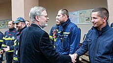 Premiér Petr Fiala p�i náv�t�v� povodn�mi zasa�eného Jeseníku