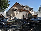 Demolice prvnho domu v Ztoru na Bruntlsku znienho povodn. Dm .p. 107...