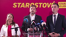 P�edseda STAN a ministr vnitra Vít Raku�an s místop�edsedy Luká�em Vl�kem a...