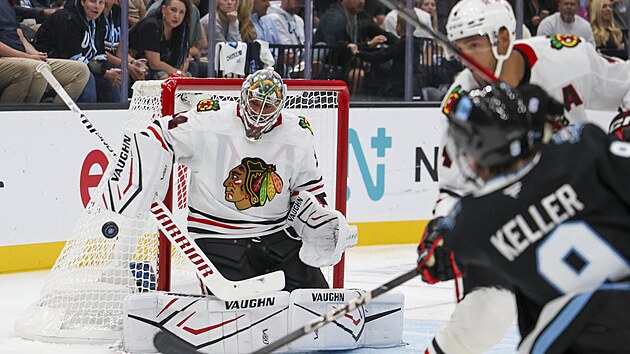 Brank Petr Mrzek z Chicaga el stele Claytona Kellera z Utahu.