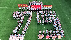 75 let u moci. �ín�tí pioný�i slaví 75. výro�í vzniku �ínské lidové republiky....