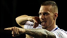 Slovenský fotbalista Luká� Haraslín se raduje z gólu v zápase s Ázerbájd�ánem.