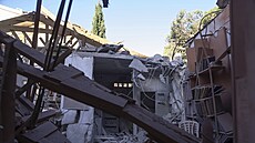 kody po dopadu rakety z Libanonu do centra izraelské Haify. (17. 11. 2024)