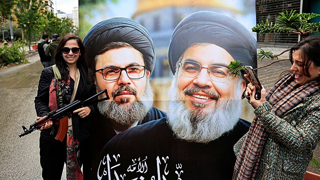 P��znivci Hizball�hu oslavuj� uzav�en� p��m��� s Izraelem. (27. listopadu 2024)