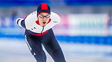 eský rychlobrusla Metodj Jílek jede závod na 5000 metr v Pekingu.