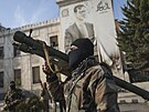 Syr�tí povstalci v centru m�sta Hamá (6. prosince 2024)