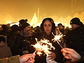 Lidé v centru Prahy slaví p�íchod roku 2025. (1. ledna 2025)