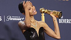 Zoe Saldana s cenou za nejlepí enský herecký výkon ve vedlejí roli za film...