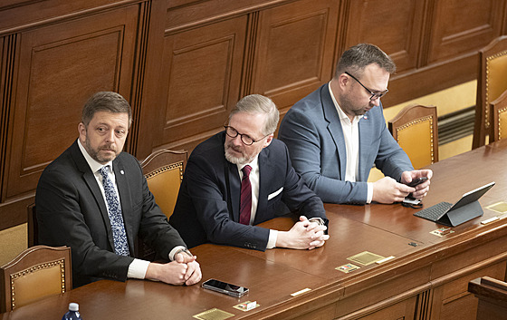 Ministr vnitra Vít Raku�an, premiér Petr Fiala a ministr práce a sociálních...