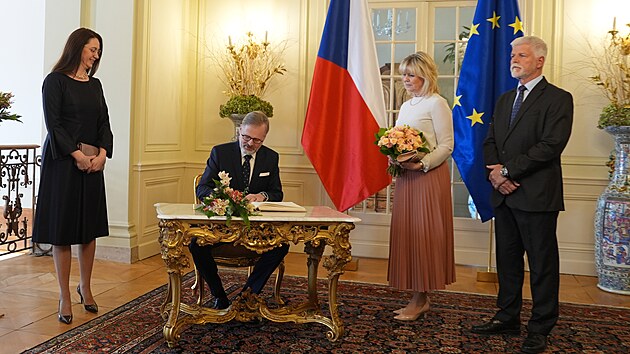 �esk� premi�r Petr Fiala s man�elkou Janou Fialovou na spole�n�m ob�d� s prezidentem Petrem Pavlem a Evou Pavlovou. (13. ledna 2025)