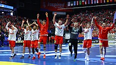 Dán�tí házenká�i slaví výhru na MS nad Tuniskem.