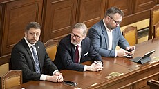 Ministr vnitra Vít Raku�an, premiér Petr Fiala a ministr práce a sociálních...