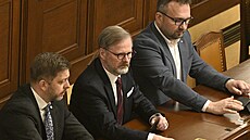 Ministr vnitra Vít Raku�an, premiér Petr Fiala a ministr práce a sociálních...