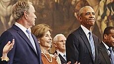 George W. Bush a Michelle Obamová.