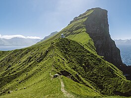 Faerské ostrovy jsou vzdálené souostroví v severním Atlantiku známé pro svou...