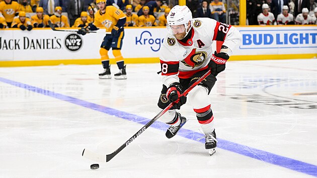 Claude Giroux s pukem na holi.