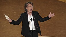 Mick Jagger oznamuje dr�itele Oscara za nejlep�í filmovou píse� roku (2. b�ezna...