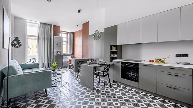 Do jedné místnosti se designérce poda�ilo vkusn� poskládat v�echno, co bude...