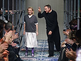 Miuccia Prada (75) + Raf Simons