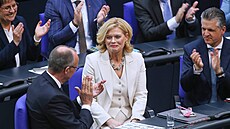 Friedrich Merz a Julia Klöcknerová v Bundestagu (25. bezna 2025)