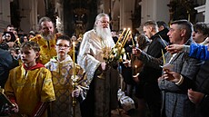 T�i tisíce v��ících, p�evá�n� Ukrajinc�, se v noci ze soboty na ned�li...
