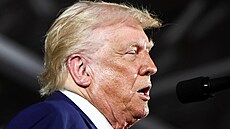 Americký prezident Donald Trump na mítinku s volii ve stát Michigan chválil...