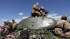 Komunisté se u p�íle�itosti 80. výro�í konce druhé sv�tové války p�esunuli z...