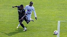 Fotbalisté Vykova (v bílém) odehráli zápas 29. kola druhé ligy proti ikovu...