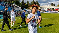 Fotbalisté Vykova (v bílém) odehráli zápas 29. kola druhé ligy proti ikovu...