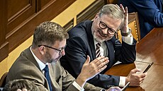 Premiér Petr Fiala (vlevo) a pedseda hnutí STAN Vít Rakuan.