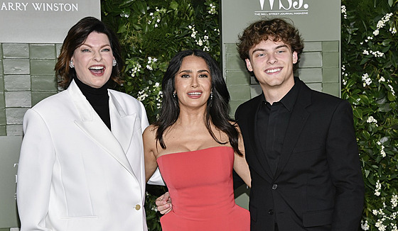 Linda Evangelista, Salma Hayeková a Augustin Evangelista v New Yorku (29. íjna...