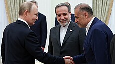 Vladimir Putin při setkání s íránským ministrem zahraničních věcí Abbásem...