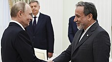 Vladimir Putin pi setkání s íránským ministrem zahraniních vcí Abbásem...