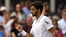 Portugalský deblista Francisco Cabral uctil ve Wimbledonu památku zesnulého...